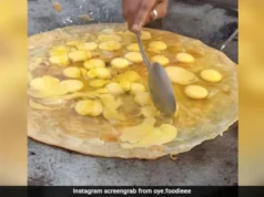 Would You Try This Viral Video of a Street Vendor Making a Massive Roll With 30 Eggs?