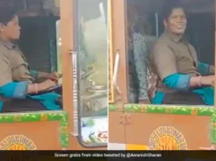 Internet calls the image of the woman driving the truck with a smile “inspirational.” the woman driving